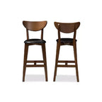 Tabouret de bar Eline en similicuir noir style Mid-Century Modern avec finition noyer