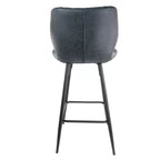 Chaise de bar en similicuir noir surpiqué en losange avec pieds en métal