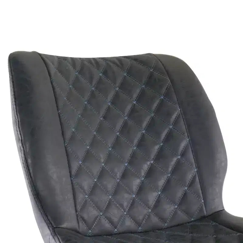 Chaise de bar en similicuir noir surpiqué en losange avec pieds en métal