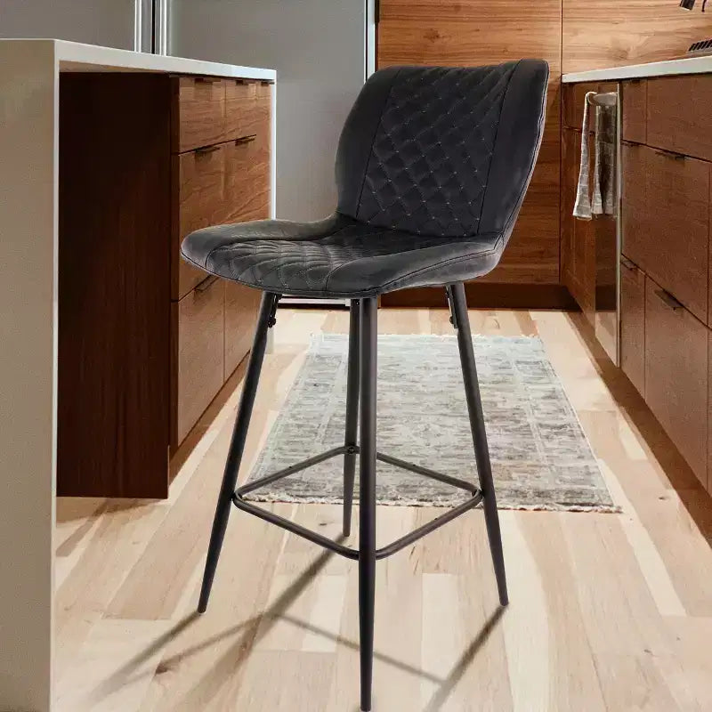 Chaise de bar en similicuir noir surpiqué en losange avec pieds en métal